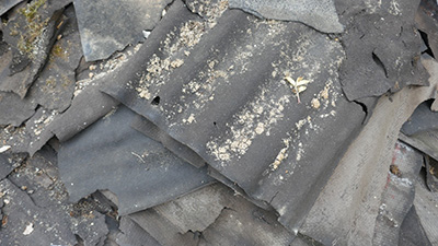 Picture of broken asbestos felt